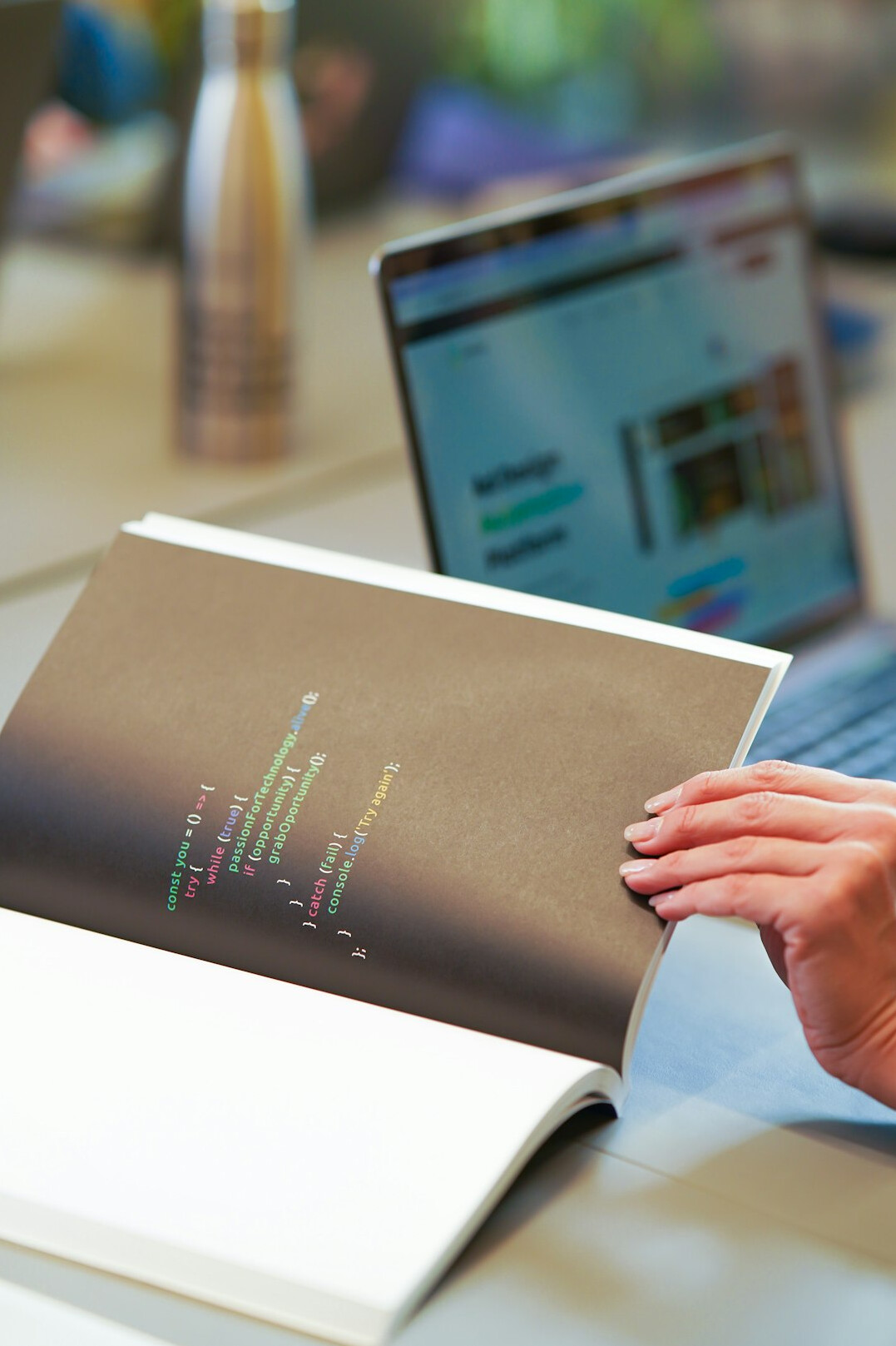 woman coding on laptop