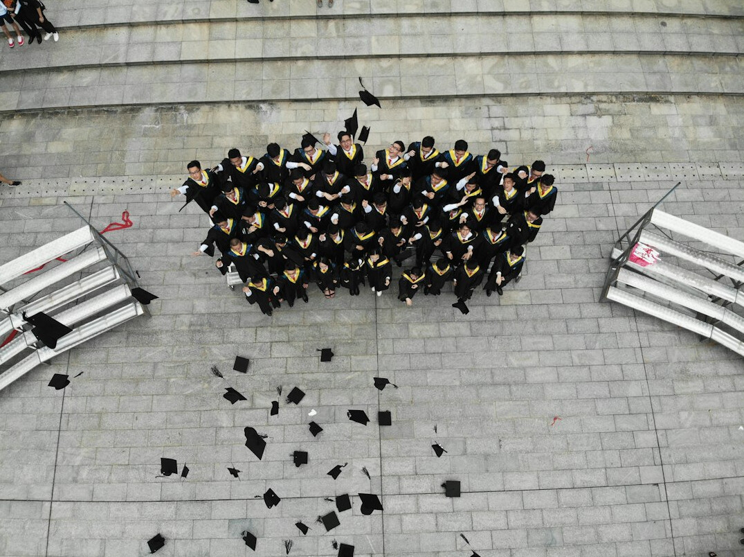 graduates celebrating success